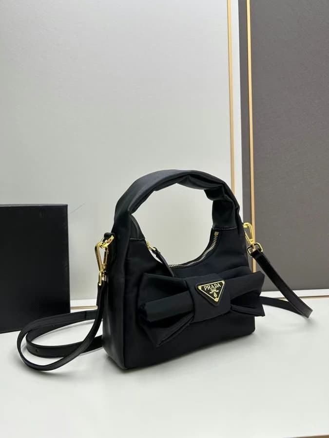 Authentic Prada Black Nylon Handbag with Elegant Bow