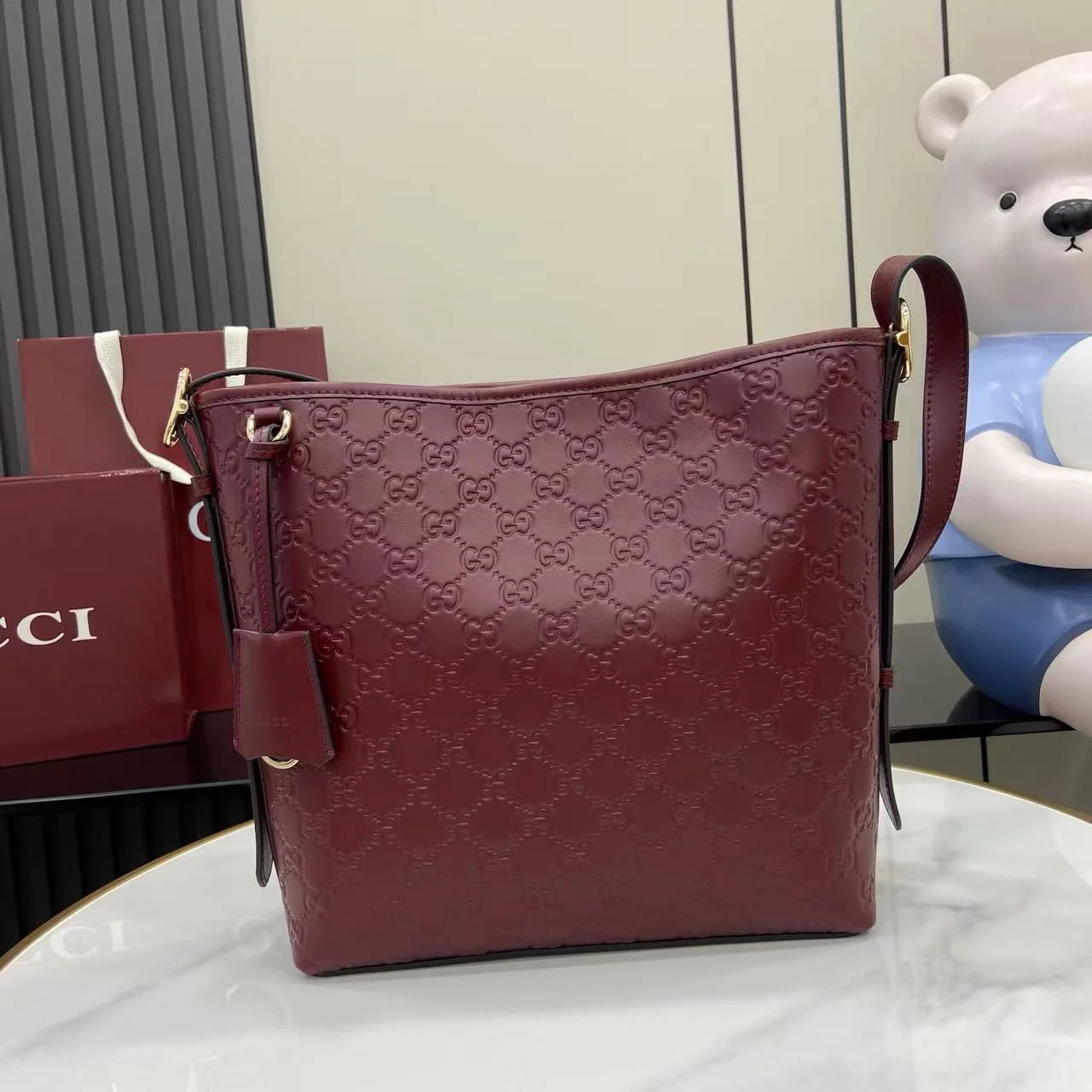 Gucci GG735 Emblem Medium Bucket Bag