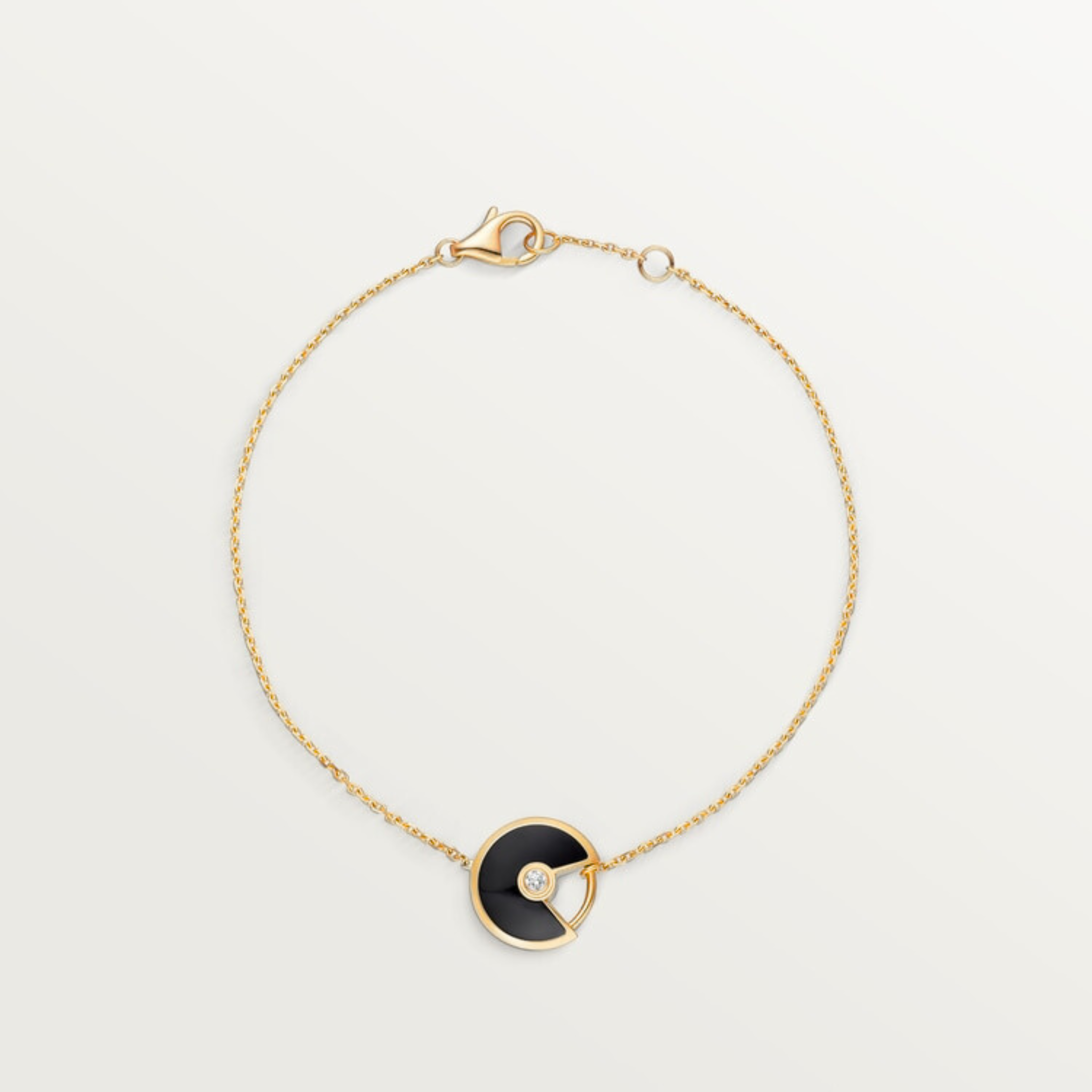 GOURMETTE CARTIER AMULETTE NOIR ONYX GOLD