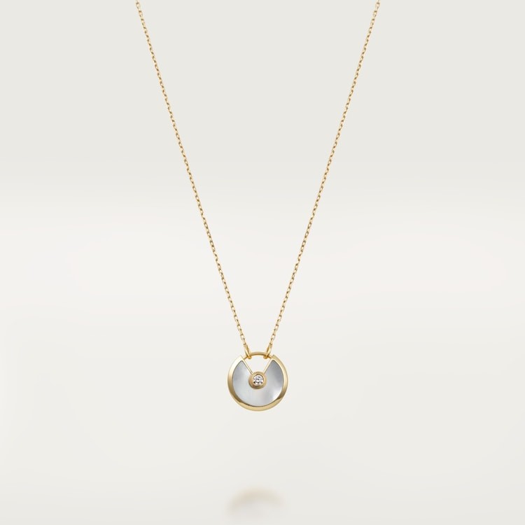COLLIER CARTIER AMULETTE NACRE GOLD