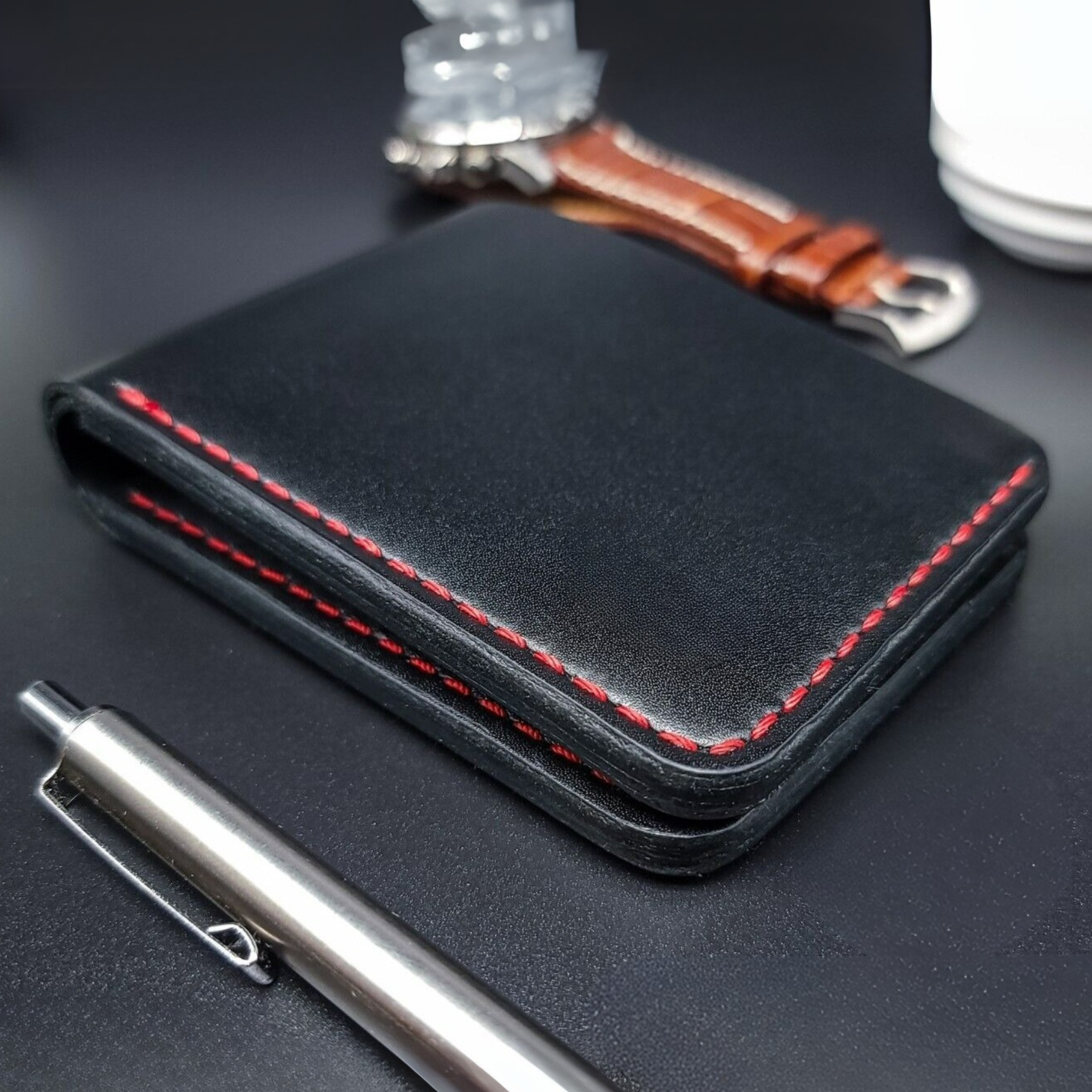 Le Portefeuille Classique en Cuir Noir – Un symbole de raffinement au quotidien